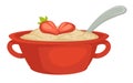 Oatmeal with strawberry in bowl with handles and spoon isolated dish