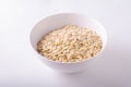 Oatmeat in bowl white Royalty Free Stock Photo