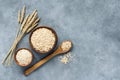 Oats, rolled oats and oat flakes in wooden bowl, top view Royalty Free Stock Photo