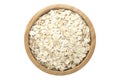 Oats in wooden bowl isolated top view on white Royalty Free Stock Photo