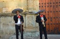 Oaxaca, Mexico-November 3, 2016: Mariachi singers take a break from singing to joke around