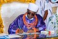 Oba of Benin gets documents on repatriated artefacts. Royalty Free Stock Photo