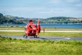 Oban Scotland - May 17 2017: Red Air ambulance starting to fly back to Ireland