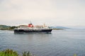 Oban, United Kingdom - February 20, 2010: Cruise liner in sea. Holiday ship navigate along sea coast. Marine travel