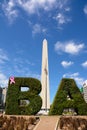 Obelisk and BA text with hedge in Buenos Aires