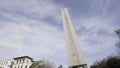 The obelisk Dikilitas, Istanbul. Action. Giant monument with Egyptian hieroglyphs on blue cloudy sky background. Royalty Free Stock Photo