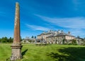 Obelisk and Dumfries House in Cumnock, Scotland, UK. Royalty Free Stock Photo