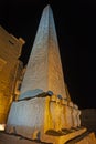 Obelisk with hieroglyphics at ancient egyptian Luxor Temple in night Royalty Free Stock Photo