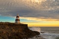 Obelisk, a historic landmark at Cape Dombey during sunset in Rob