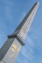 The Obelisk of Luxor on the Place de la Concorde in sunny day. Famous sight of Paris. Luxor obelisk close up and hieroglyphics on