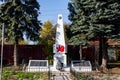Obelisk with a red Soviet star over the mass grave of the Great Patriotic War 1941-1945 in the village of Papino, Zhukovsky