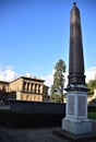 Obelisk, silhouetted in the blue sky, inside Palazzo Pitti in Florence. Royalty Free Stock Photo