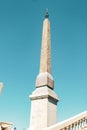 Obelisk stands atop a grand marble staircase, illuminated by natural light Royalty Free Stock Photo