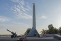 Obelisk of Victory and the eternal flame on the Volga embankment. Text translation -Heroes of the front and rear