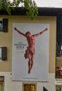 Huge advertising board for the Passion Play 2020 on the wall of the Tourist Office in Oberammergau