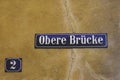Obere Brucke eng. Upper bridge street name sign in Bamberg, Bavaria, Germany