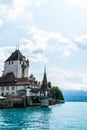 Oberhofen Castle with Thun Lake background in Switzerland