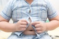 Obese Fat boy can`t button up his shirt Royalty Free Stock Photo