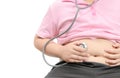 Obese fat boy check stomach by stethoscope isolated Royalty Free Stock Photo