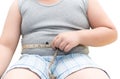 Obese fat boy measuring his belly with measurement tape Royalty Free Stock Photo