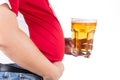Obese man with big belly holding a glass of refreshing cold beer Royalty Free Stock Photo