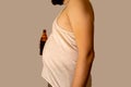 Obese man with big belly holding a glass of refreshing cold beer Royalty Free Stock Photo