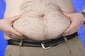 Obese Man Holding Stomach Flab Royalty Free Stock Photo