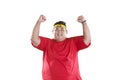 Obese man lifting hands to expressing his success