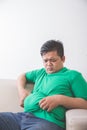 Obese man thinking about his weight problem Royalty Free Stock Photo
