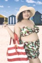 Obese woman with swimsuit at coast Royalty Free Stock Photo