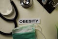 Obesity with inspiration and healthcare/medical concept on desk background