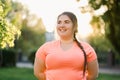 obesity people plus size woman smiling outdoors
