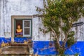 View of street shop with a weird mannequin on window Royalty Free Stock Photo