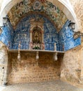 Azulejo tile shrine and chapel in the city wall and gate at Obidos in Portugal