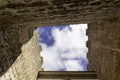 Obidos, Portugal: Point of view of the medieval castle of Obidos in Portugal. Low prospective of the castle tower against the blue Royalty Free Stock Photo