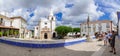 Obidos, Portugal. Santa Maria Church and Town Pillory seen from Direita Street. Royalty Free Stock Photo