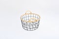 Object, circle black metal storage wire basket with nature straw decor handles on white background. idea item for contain all Royalty Free Stock Photo