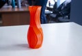 Object form vase of red color printed on a 3D printer. Three-dimensional model