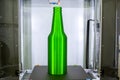 Object green bottle printed on 3D printer close-up, inside on 3d printer. Royalty Free Stock Photo