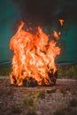 Worn motorcycle boots burning Royalty Free Stock Photo