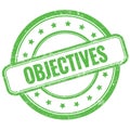 OBJECTIVES text on green grungy round rubber stamp