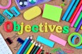 Objectives word on cork background