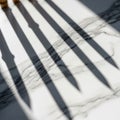 Objects creating the shadows appear to be evenly spaced, suggesting a Royalty Free Stock Photo