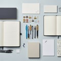 Objects include a small square of graph paper a white notepad with an Royalty Free Stock Photo