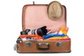 Suitcase with clothes and other travel accessories Royalty Free Stock Photo