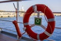 Lifebuoy on the deck of cruise ship. Royalty Free Stock Photo