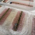 Oblique aerial photograph of an empty parking lot of a consumer market, abstract aerial view