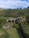 An oblique aerial view over the viaduct on the Monsal Trail in Derbyshire, UK
