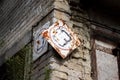 Oblique rusty plaque with number 3 on old destroyed abandoned building in pine forest near ghost town Pripyat, Chernobyl Exclusion Royalty Free Stock Photo