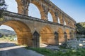 Oblique side-lit view of the Pont du Gard in southern France Royalty Free Stock Photo